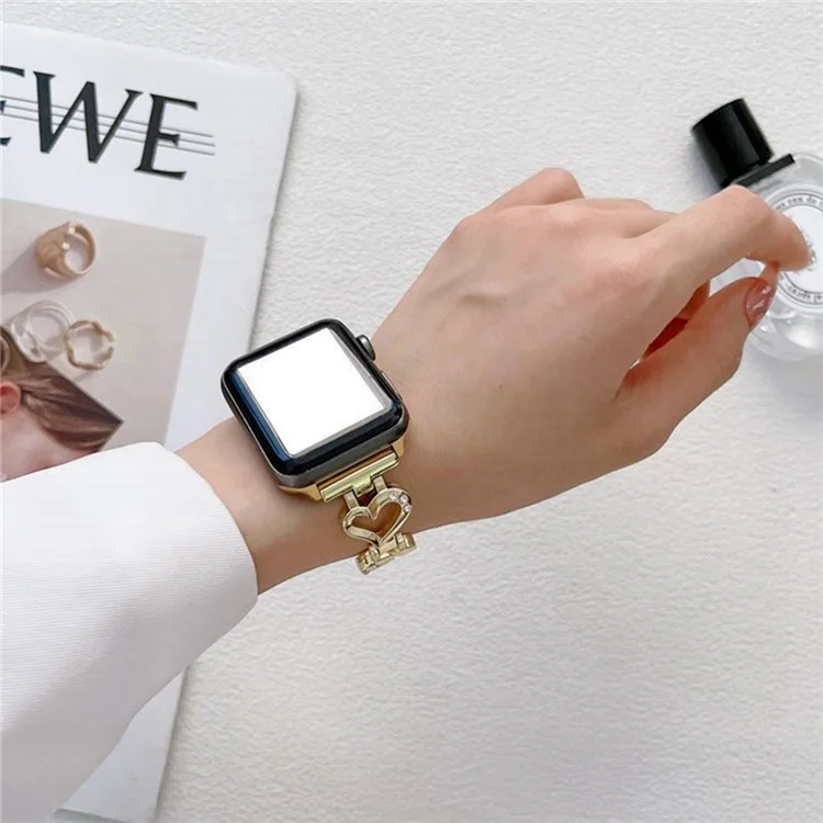 Para Apple Watch Series 10 42mm / 9 8 7 41mm / 6 5 4 SE SE (2022) SE (2023) 40mm / 3 2 1 38mm Metal Heart Rhinestone Decor Smart Watch Band Bracelet Wrist Strap - Silver
