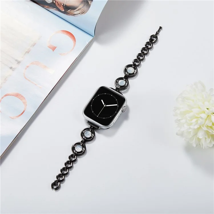 Per Apple Watch Series 10 42mm / 9 8 7 41mm / 6 5 4 SE SE (2022) SE (2023) 40mm / 3 2 1 38mm Lega di Zinco Slim Watch Band Decorazione con Strass Braccialetto Cinturino da Polso - Nero / Bianco