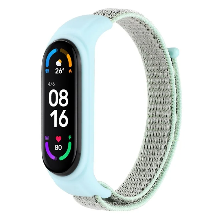 For Xiaomi Mi Band 3 / Band 4 / Band 5 / Band 6 / Band 7 Nylon Sport Band Adjustable Anti-lost Bracelet with Silicone Watch Case - Light Green
