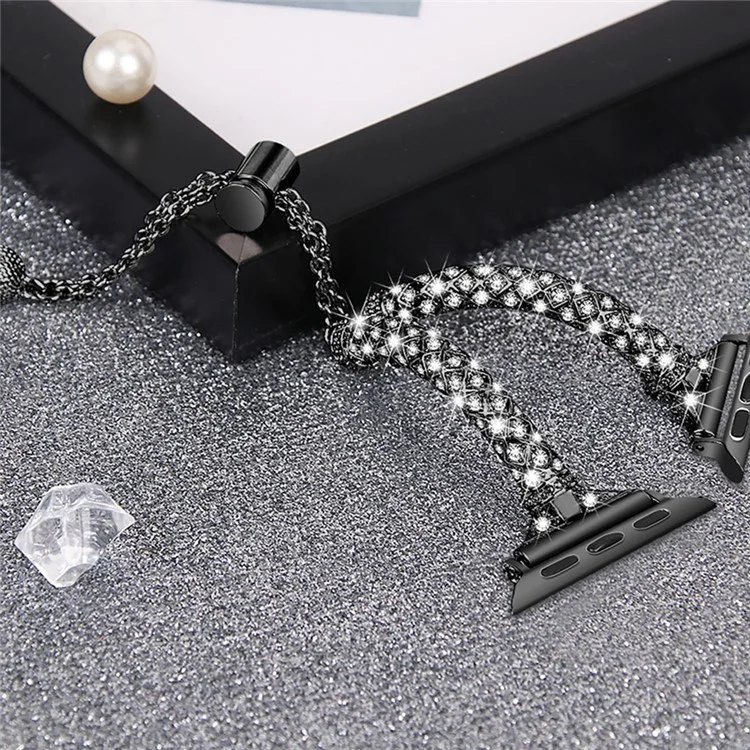 Uhrenarmband für Apple Watch Series 10 42mm / 9 8 7 41mm / SE (2023) SE (2022) SE 6 5 4 40mm / 3 2 1 38mm Rhinestone-Dekoration Kupferarmband - Schwarz