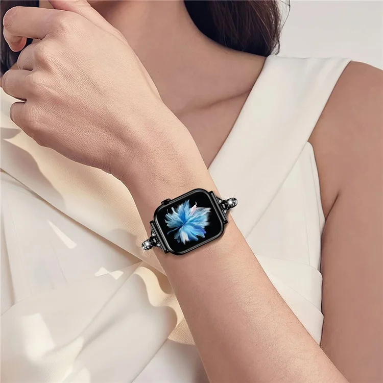Uhrenarmband für Apple Watch Series 10 42mm / 9 8 7 41mm / SE (2023) SE (2022) SE 6 5 4 40mm / 3 2 1 38mm Rhinestone-Dekoration Kupferarmband - Schwarz