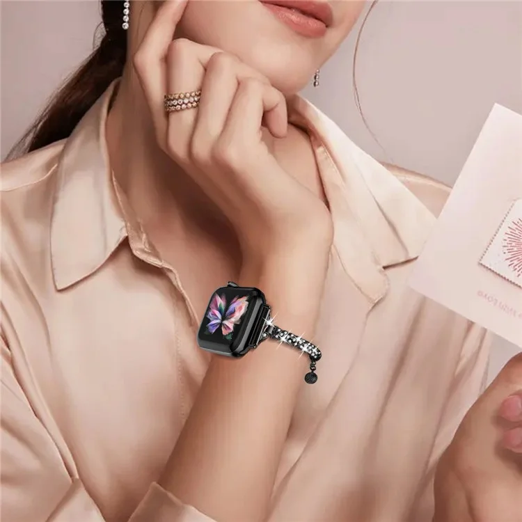 Uhrenarmband für Apple Watch Series 10 42mm / 9 8 7 41mm / SE (2023) SE (2022) SE 6 5 4 40mm / 3 2 1 38mm Rhinestone-Dekoration Kupferarmband - Schwarz