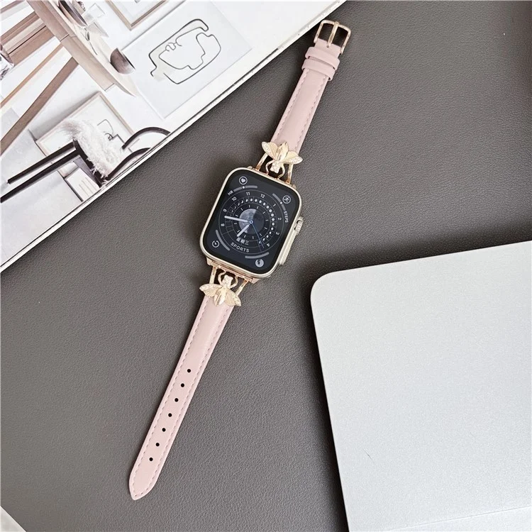Pour Apple Watch Series 10 46mm / Ultra 2 Ultra 49mm / Series 9 8 7 45mm / 6 5 4 SE (2023) SE (2022) SE 44mm / 3 2 1 42mm Véritable Bracelet en Cuir de Vache Décoration Abeille - Rose
