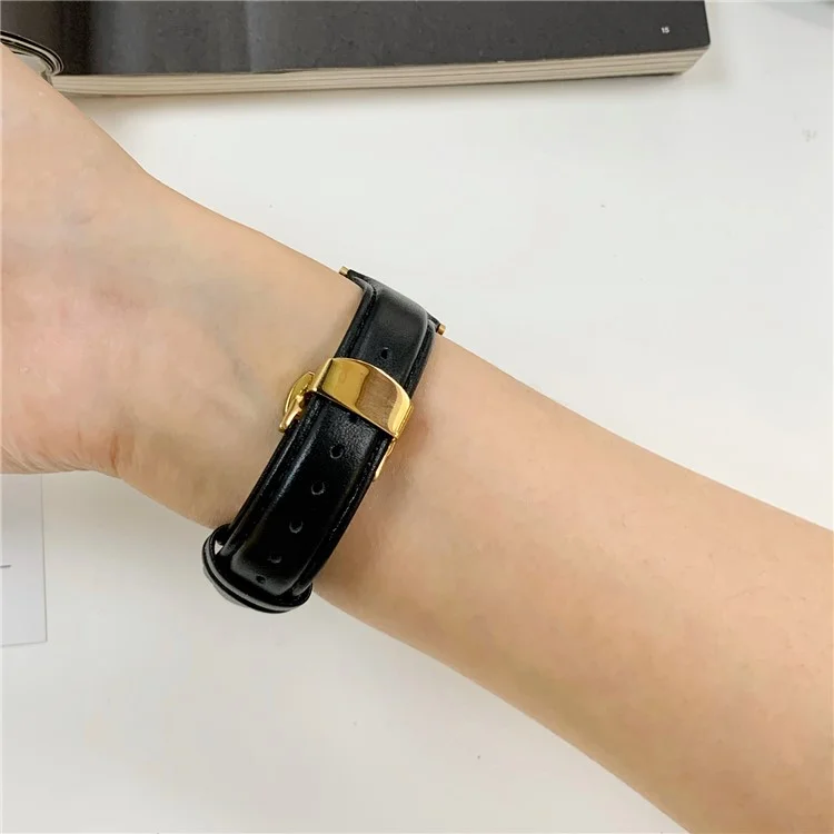 For Apple Watch 10 46mm / Ultra 2 / Ultra 49mm / 9 8 7 45mm / SE (2023) SE (2022) SE 6 5 4 44mm / 3 2 1 42mm Cow Leather Watchband Replacement Strap - Black / Gold