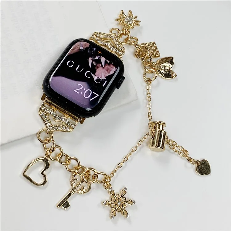 Watch Band for Apple Watch Series 10 42mm / 9 8 7 41mm / SE (2023) SE (2022) SE 6 5 4 40mm / 3 2 1 38mm Snowflake Charm Watch Strap - Gold