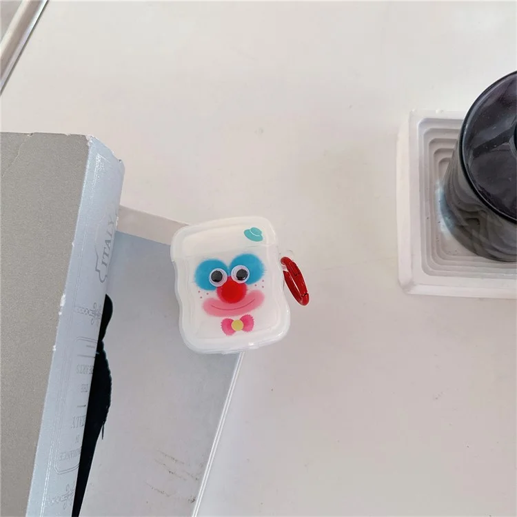 Pour le boîtier de recharge sans fil AirPods d'Apple (2019) / AirPods avec boîtier de recharge (2019) / (2016) Étui TPU coloré de clown avec boucle annulaire