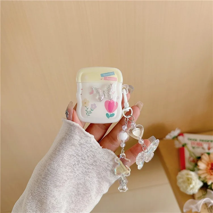 Pour Apple AirPods avec étui de chargement sans fil (2019) / AirPods avec étui de chargement (2019) / (2016) Étui TPU Butterfly et Flower avec pendentif