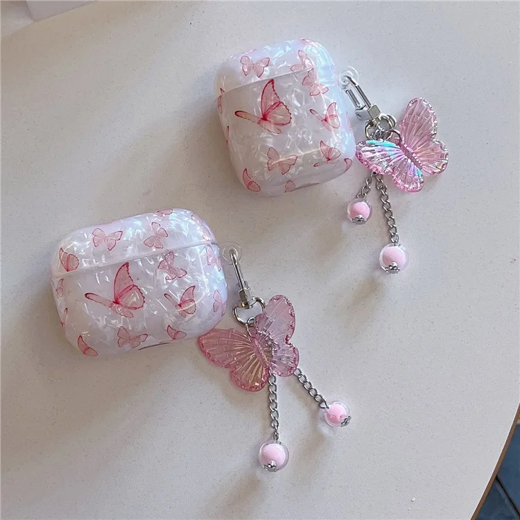 Чехол-футляр для наушников AirPods 4 с текстурным узором в виде бабочки, выполненный из ударопрочного ТПУ, с подвеской-аксессуаром