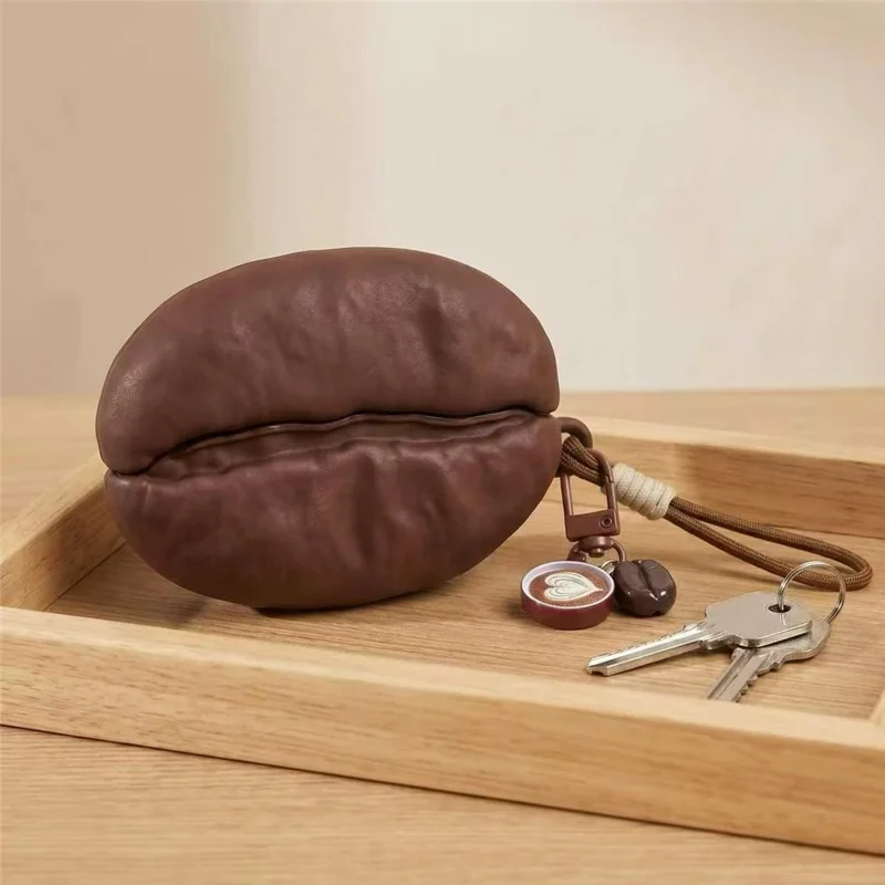 For AirPods Pro 3 Silikonfodral Kaffebönform Skyddsfodral med hänglåsnyckelkedja - Kaffe