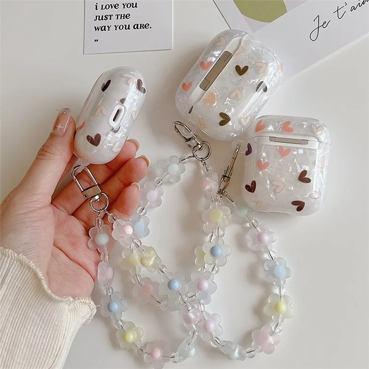 Para Apple AirPods com Case de Carregamento (2016)/(2019)/AirPods com Case de Carregamento Sem Fio (2019) Lovely Heart Pattern Flower Wrist Strap Bluetooth Earphone Protective Cover TPU Case