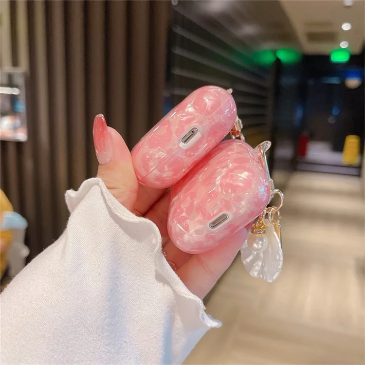 Pour Apple AirPods Avec Cas de Charge (2016) / (2019) / AirPods Avec Case de Charge Sans Fil (2019) Grain Shell Grain TPU Bluetooth Ecoutphone Charging Couvercle de Protection Avec Pendentif en Forme de Coque