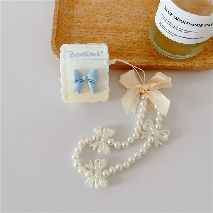 Pour Apple AirPods Avec Cas de Charge (2016) / (2019) / AirPods With Wireless Charging Case (2019) Bowknot Design Soft TPU Protective Protective Couvercle Bluetooth Ecoutphone With Pearls Pendant Perles