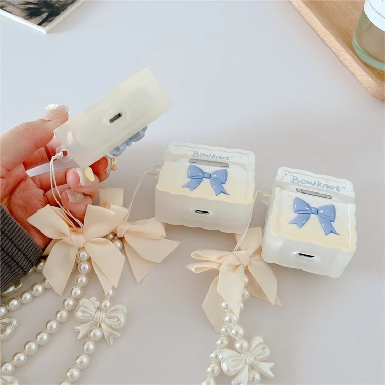 Pour Apple AirPods Avec Cas de Charge (2016) / (2019) / AirPods With Wireless Charging Case (2019) Bowknot Design Soft TPU Protective Protective Couvercle Bluetooth Ecoutphone With Pearls Pendant Perles