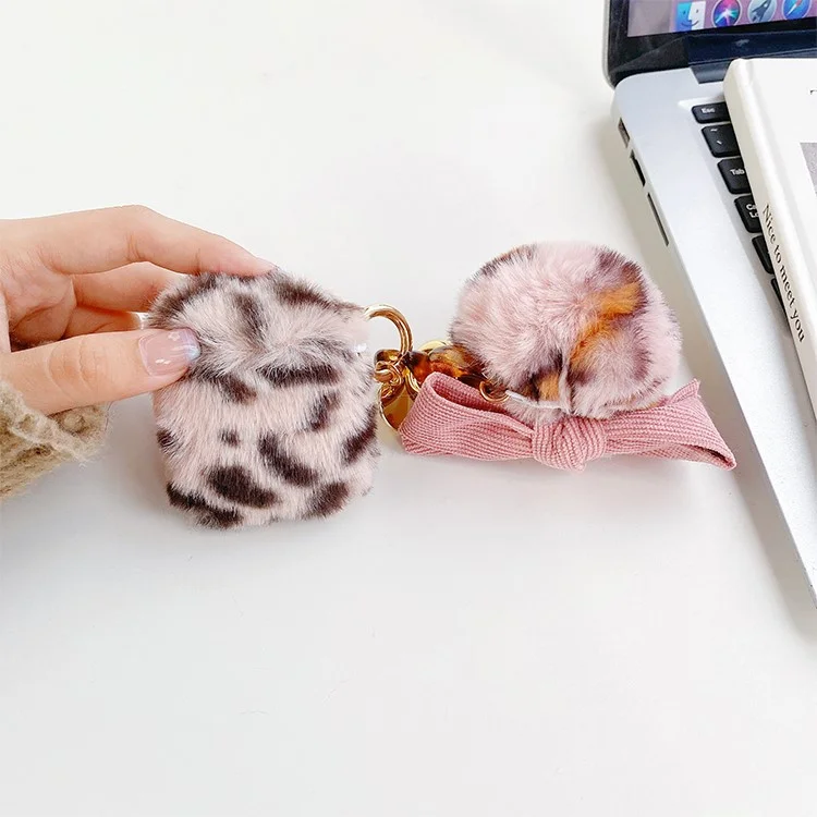 For Apple AirPods with Charging Case (2016)  /  (2019)  /  AirPods with Wireless Charging Case (2019) Leopard Pattern Soft Fake Fur Coated TPU Protective Cover with Bowknot Pompom - Pink