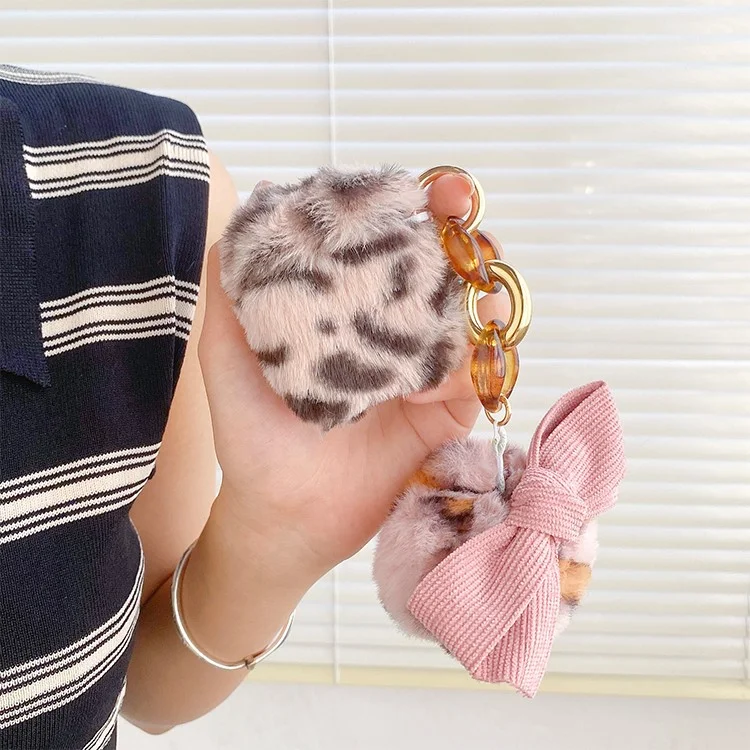 Per Apple AirPods Con Case Case (2016) / (2019) / AirPods With Wireless Ricarica (2019) Pattern Leopardo Morbido Copertura Protettiva TPU Rivestita in Pelliccia Con Bowknot Pompom - Rosa