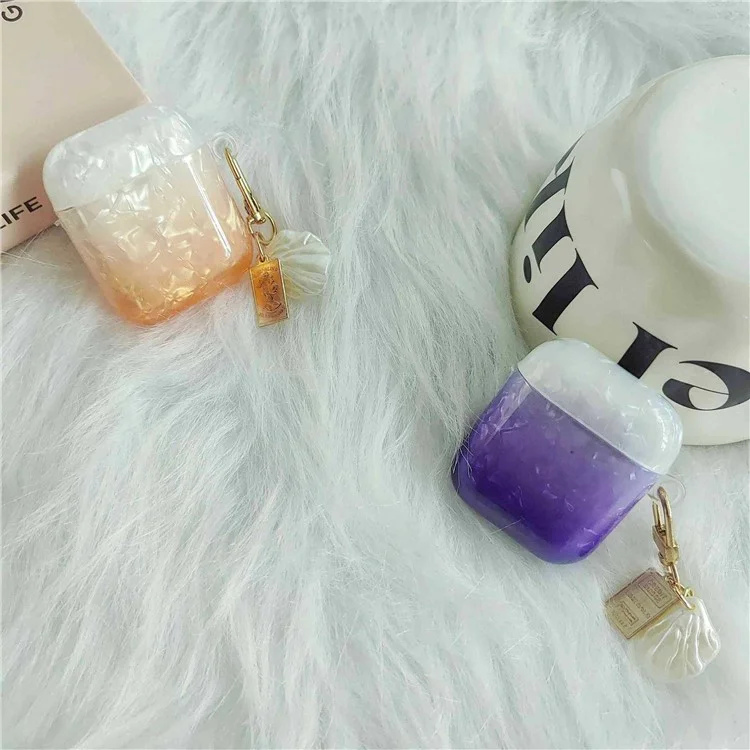Custodia per cuffie Earphone per Apple AirPods con custodia di ricarica (2016) / (2019) / AirPods con custodia di ricarica wireless (2019), custodia in TPU a grana di conchiglia sfumata con pendente - Arancione