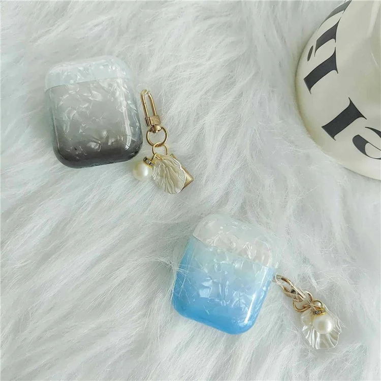 Custodia per cuffie Earphone per Apple AirPods con custodia di ricarica (2016) / (2019) / AirPods con custodia di ricarica wireless (2019), custodia in TPU a grana di conchiglia sfumata con pendente - Arancione