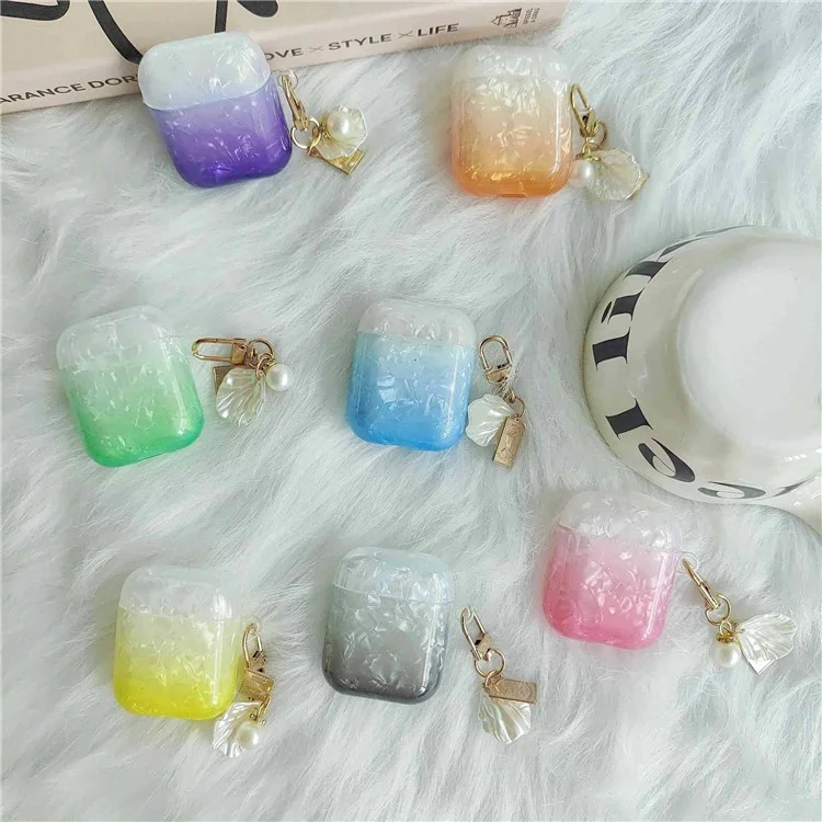 Custodia per cuffie Earphone per Apple AirPods con custodia di ricarica (2016) / (2019) / AirPods con custodia di ricarica wireless (2019), custodia in TPU a grana di conchiglia sfumata con pendente - Arancione