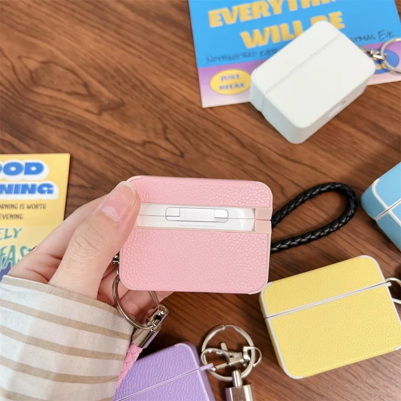 For Apple AirPods Pro 2 Protective Case Litchi Texture PU+TPU Bluetooth-compatible Earbuds Charging Case Cover with Strap - Pink