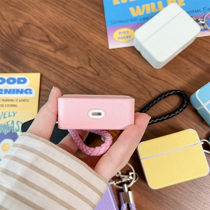 For Apple AirPods Pro 2 Protective Case Litchi Texture PU+TPU Bluetooth-compatible Earbuds Charging Case Cover with Strap - Pink