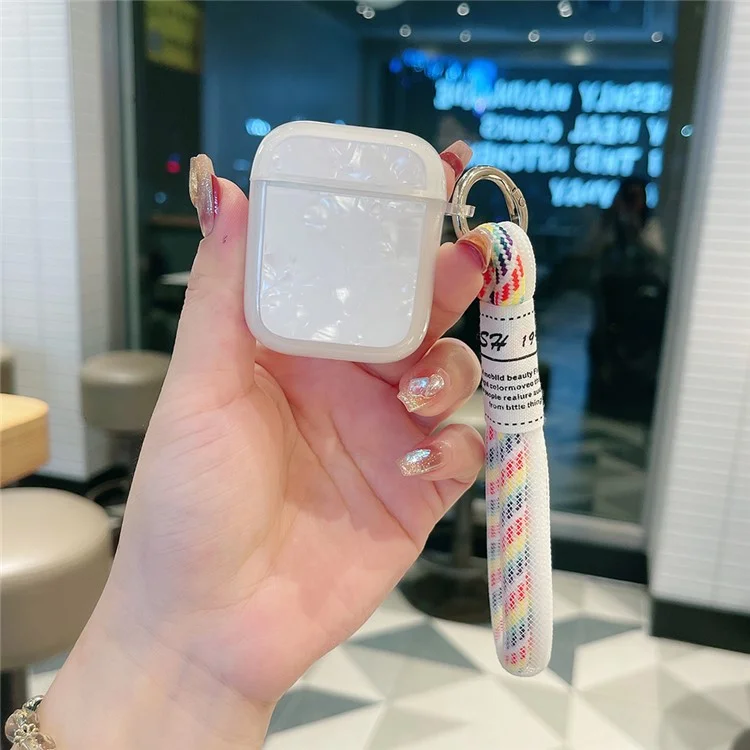 Para Apple AirPods com Estojo de Carregamento (2016) / (2019) / AirPods com Estojo de Carregamento sem Fio (2019) Capa Protetora TPU com Alça - Padrão de Concha