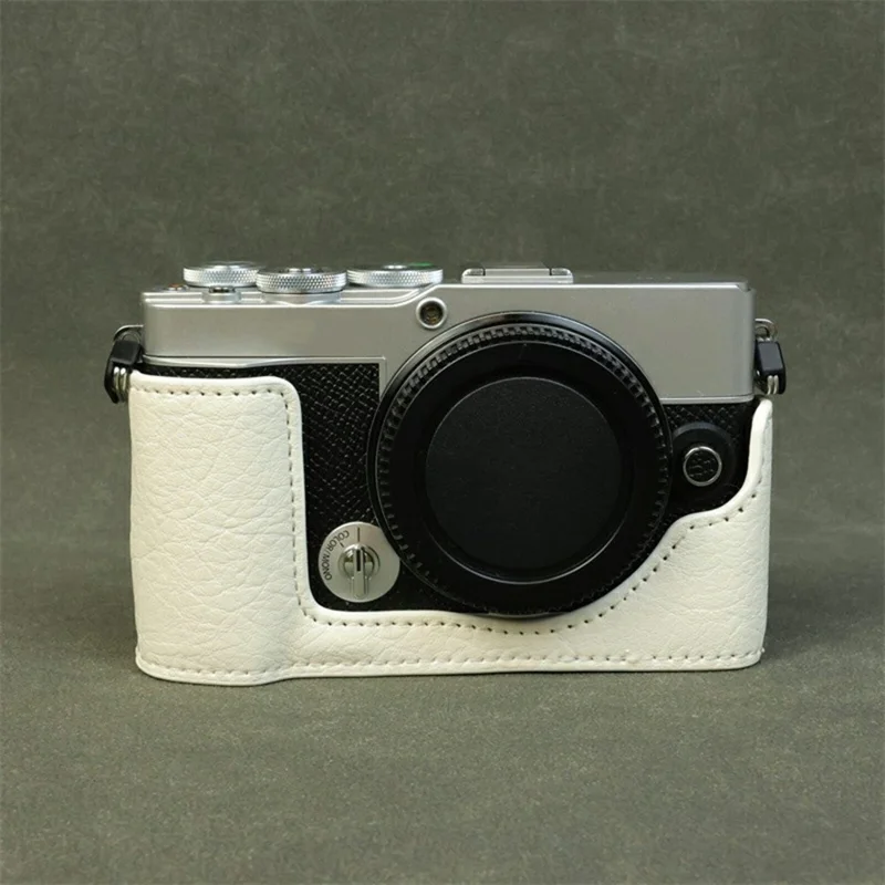 For Olympus PEN E-P7 Camera Bottom Case Buffalo Texture Battery Opening PU Leather Half Cover with Shoulder Strap - White