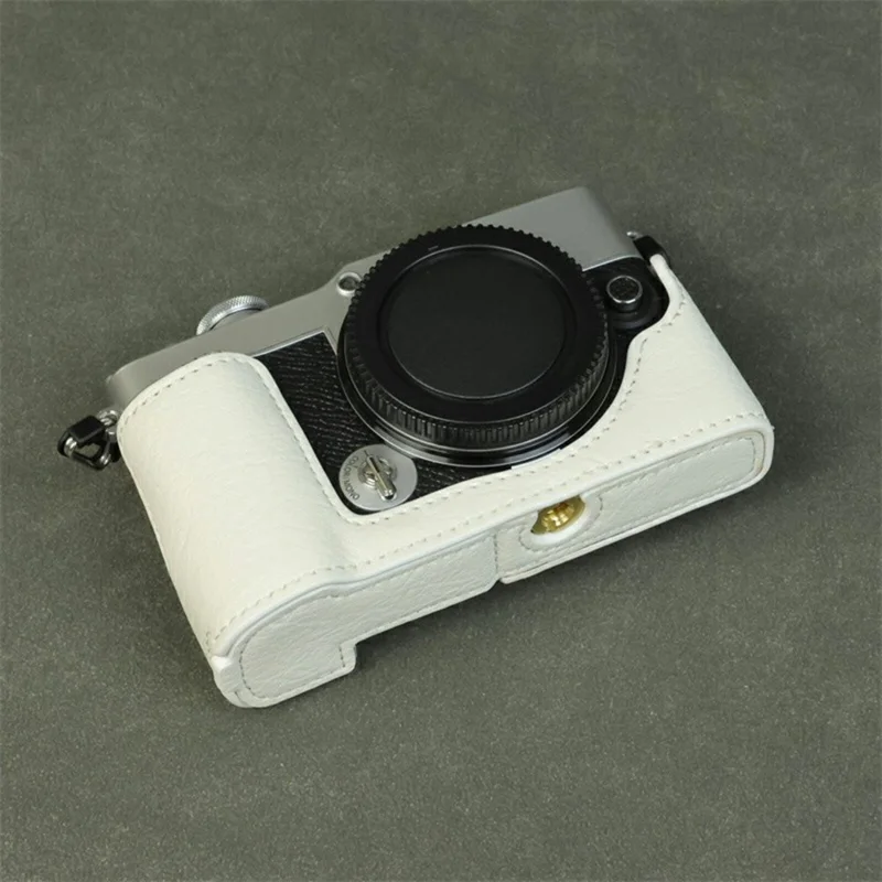 For Olympus PEN E-P7 Camera Bottom Case Buffalo Texture Battery Opening PU Leather Half Cover with Shoulder Strap - White