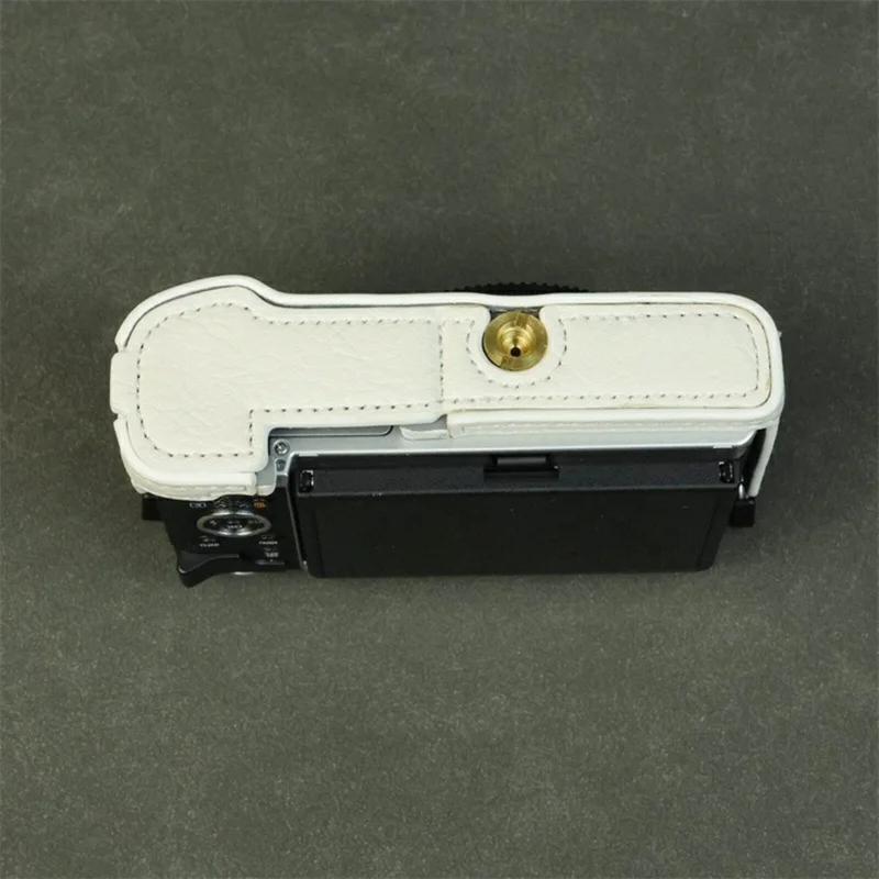 For Olympus PEN E-P7 Camera Bottom Case Buffalo Texture Battery Opening PU Leather Half Cover with Shoulder Strap - White