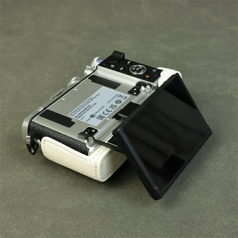 For Olympus PEN E-P7 Camera Bottom Case Buffalo Texture Battery Opening PU Leather Half Cover with Shoulder Strap - White