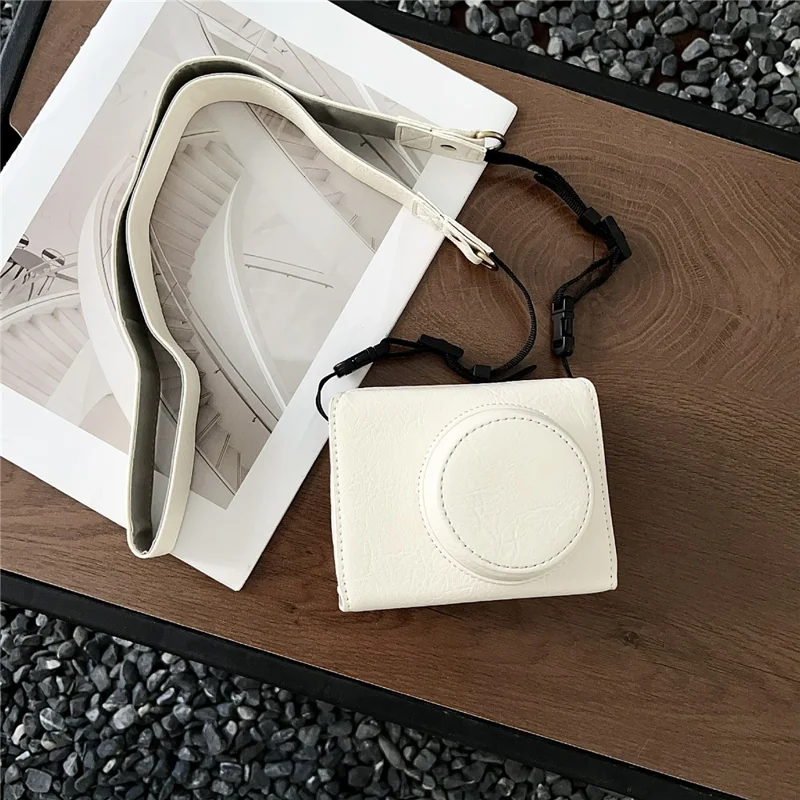 For Canon PowerShot V1 Camera Case Buffalo Texture Battery Opening Design Leather Cover with Shoulder Strap - White