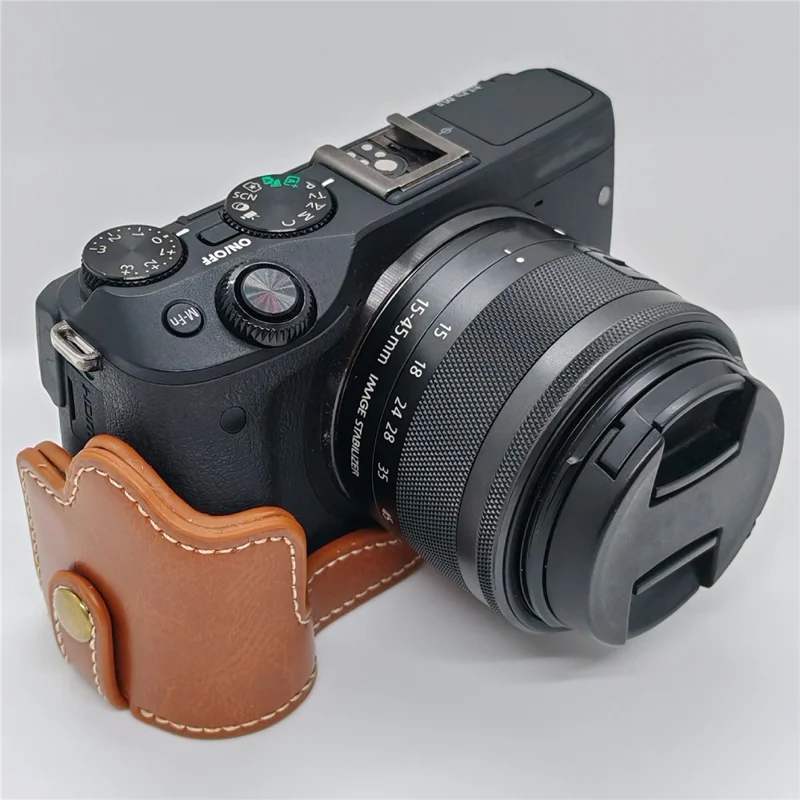 Funda de cuero PU con apertura para batería para cámara Canon EOS M3 - Marrón