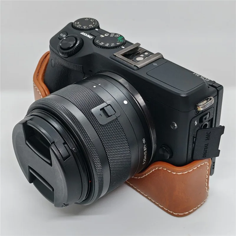 Funda de cuero PU con apertura para batería para cámara Canon EOS M3 - Marrón