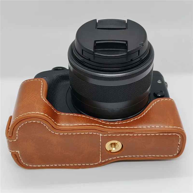 Funda de cuero PU con apertura para batería para cámara Canon EOS M3 - Marrón