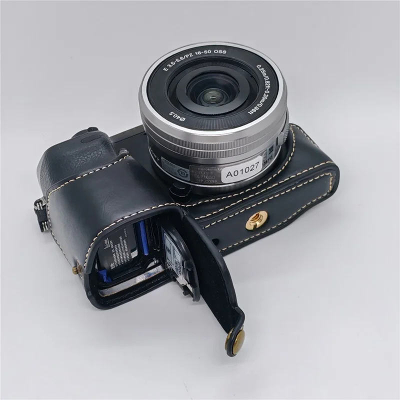 غطاء كاميرا نصف جسم لسوني NEX-7 / NEX-6 مع إمكانية الوصول إلى البطارية، غطاء سفلي من جلد البولي يوريثان - أسود