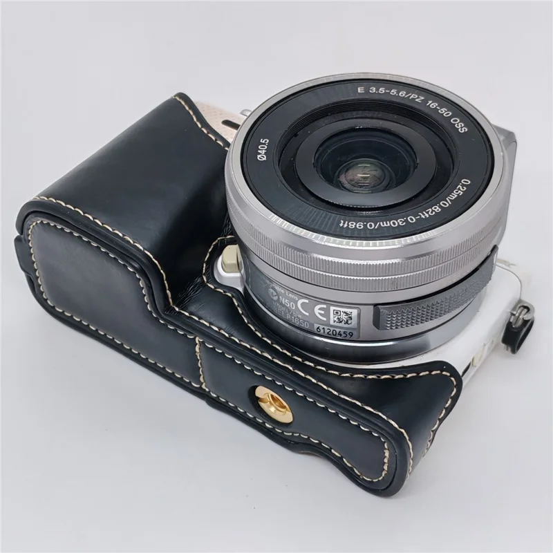PU Leather Camera Half Case with Strap for Sony NEX-5  /  NEX-5C  /  NEX-5T  /  NEX-5R Camera Protective Cover with Battery Access Tripod Compatible Access - Black