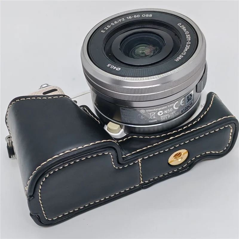 PU Leather Camera Half Case with Strap for Sony NEX-5  /  NEX-5C  /  NEX-5T  /  NEX-5R Camera Protective Cover with Battery Access Tripod Compatible Access - Black