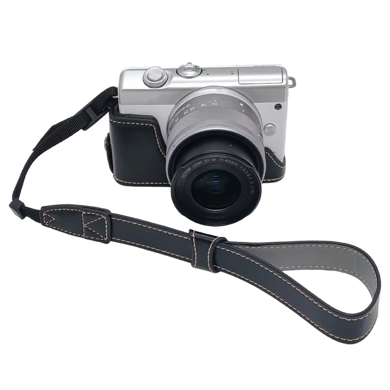 حالة الكاميرا لـ Canon EOS M10 / M100 / M200 غطاء جزئي من الجلد الصناعي مع حزام يد وفتحة قابلة للإزالة لاستبدال البطارية - أسود