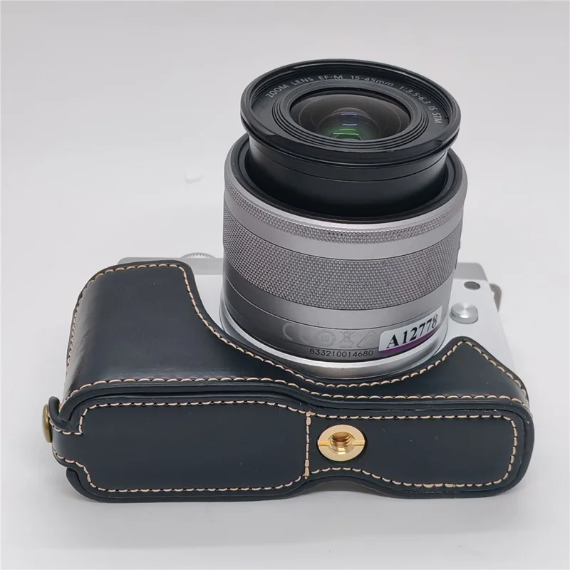 حالة الكاميرا لـ Canon EOS M10 / M100 / M200 غطاء جزئي من الجلد الصناعي مع حزام يد وفتحة قابلة للإزالة لاستبدال البطارية - أسود