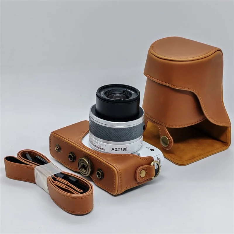 Étui en cuir pour appareil photo Nikon J1 / J2, housse demi-enveloppante avec bandoulière, protection en cuir PU - Café