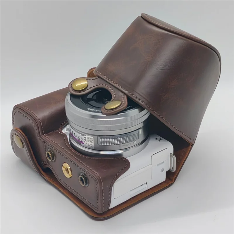 For Sony ZV-E10 Camera Case PU Leather Battery Access Opening Protective Cover with Shoulder Strap - Coffee