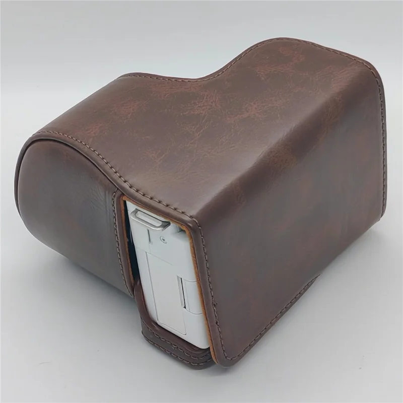 For Sony ZV-E10 Camera Case PU Leather Battery Access Opening Protective Cover with Shoulder Strap - Coffee