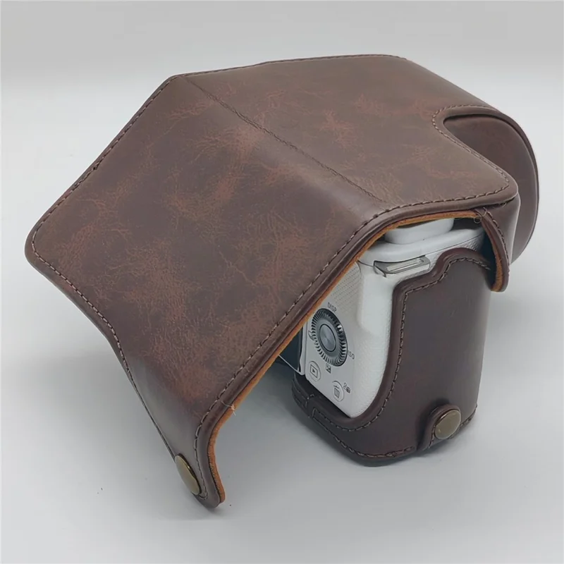 For Sony ZV-E10 Camera Case PU Leather Battery Access Opening Protective Cover with Shoulder Strap - Coffee