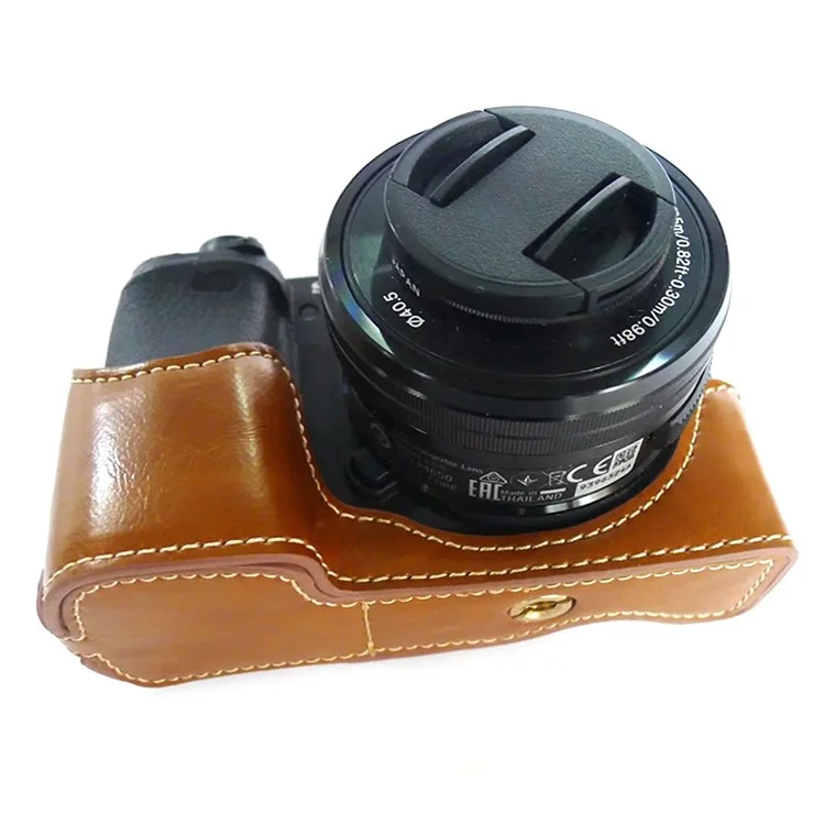 For Sony A6400 / A6300 / A6000 Battery Opening Bottom Case PU Leather Half Body Protective Cover with Hand Strap - Brown