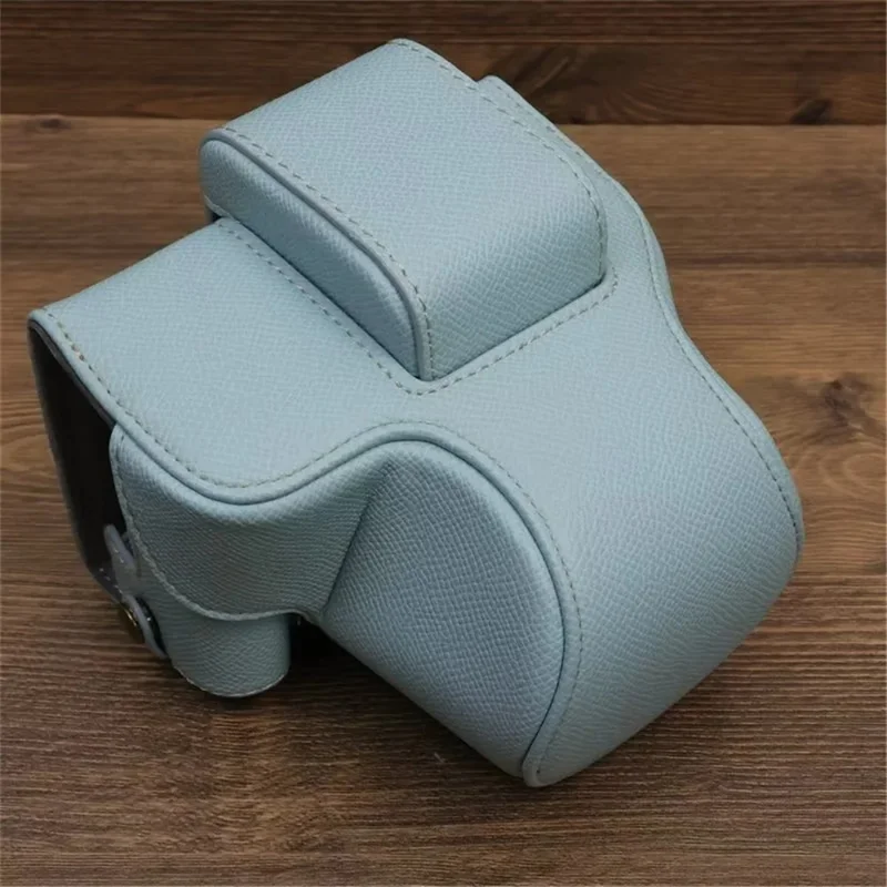 For Canon EOS R50 / R100 Camera Case Battery Opening Design Palm Texture Leather Bag with Strap and Small Bag - Baby Blue