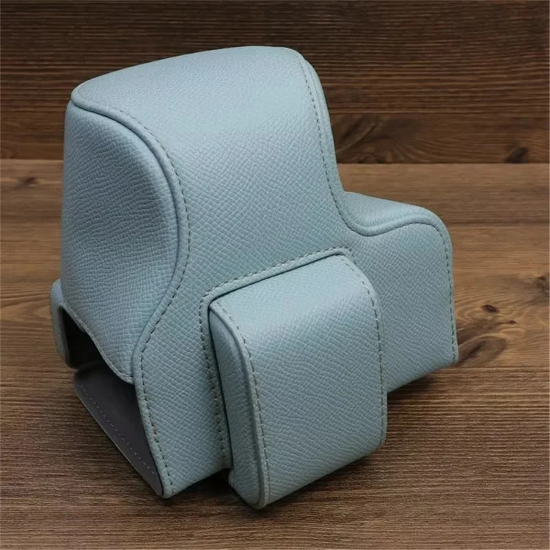 For Canon EOS R50 / R100 Camera Case Battery Opening Design Palm Texture Leather Bag with Strap and Small Bag - Baby Blue