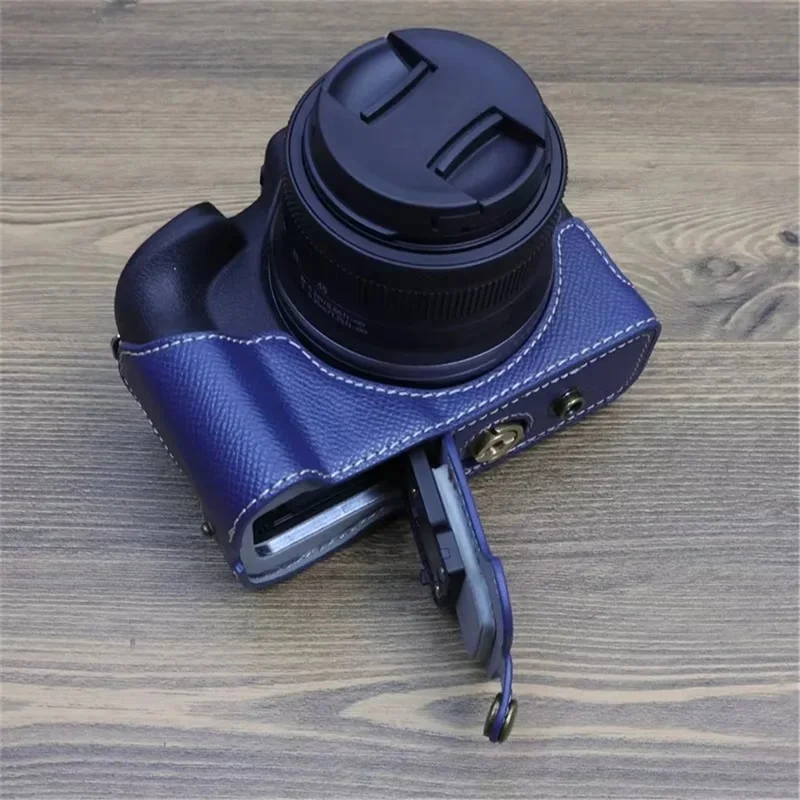 For Canon EOS R50 / R100 Camera Case Battery Opening Design Palm Texture Leather Bag with Strap and Small Bag - Baby Blue