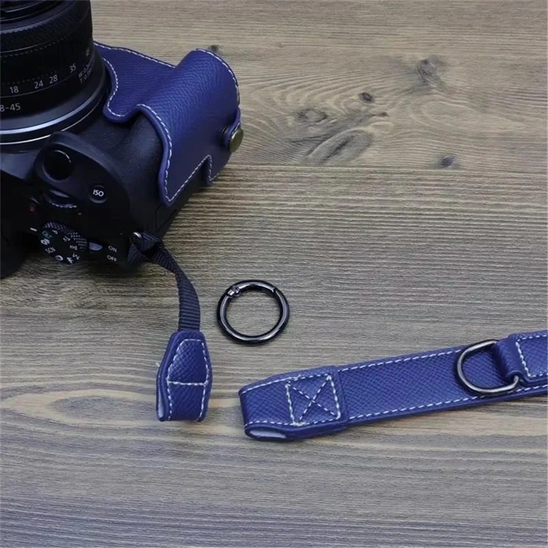 For Canon EOS R50 / R100 Camera Case Battery Opening Design Palm Texture Leather Bag with Strap and Small Bag - Baby Blue