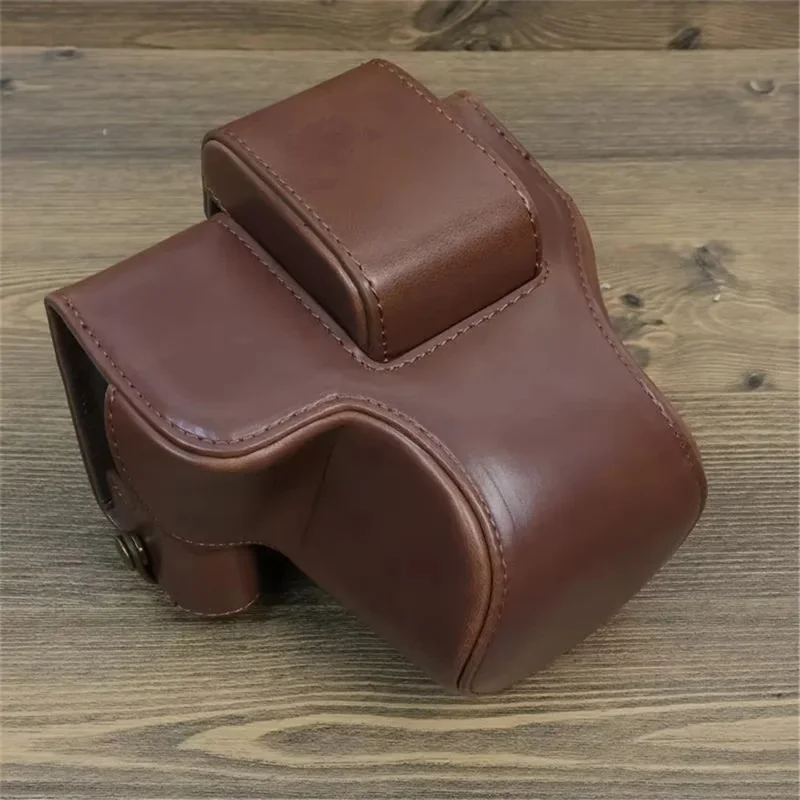 For Canon EOS R50 / R100 PU Leather Camera Case Battery Opening Design Camera Cover with Strap and Small Bag - Coffee