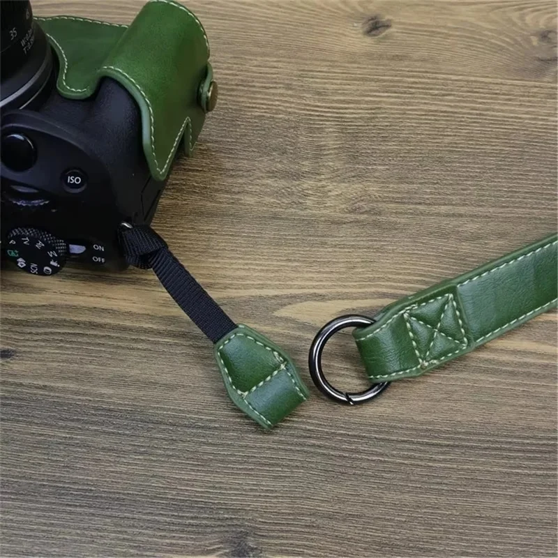 For Canon EOS R50 / R100 PU Leather Camera Case Battery Opening Design Camera Cover with Strap and Small Bag - Coffee