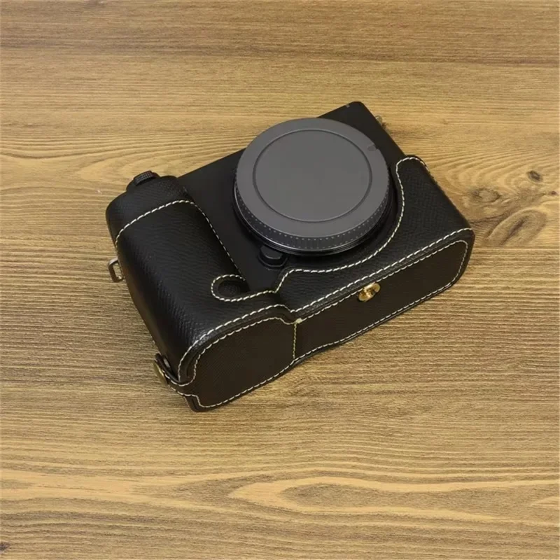 For Sony ZV-E1 Battery Opening Design PU Leather Camera Bottom Cover Half Body Case with Hand Strap - Black